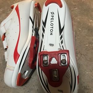 White peloton cycle shoes with clips